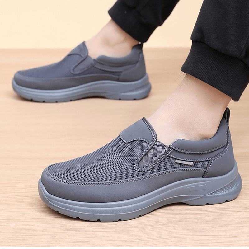 👟 60% RABATT NU! ✨ Ortopediska Andningsbara Slip-On-Sneakers för Män - Stödjer Sulgång med Minnesskuminsatser för Bekväm Heltidsanvändning 🏃‍♂️💨